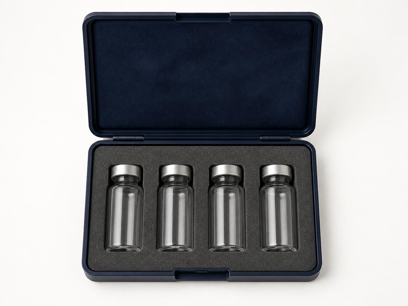 Open case with cut foam interior holding unlabelled glass vials
